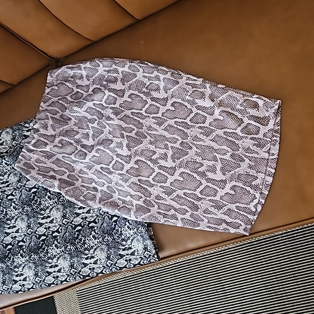 Pink and black animal print fashion over pencil skirt with a shimmer.